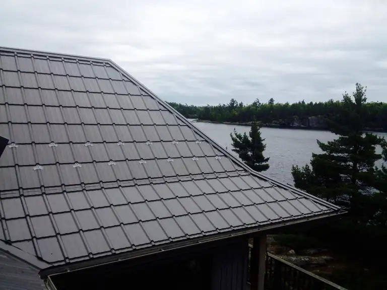 Slate Shake steel tile metal roofing panel on a roof